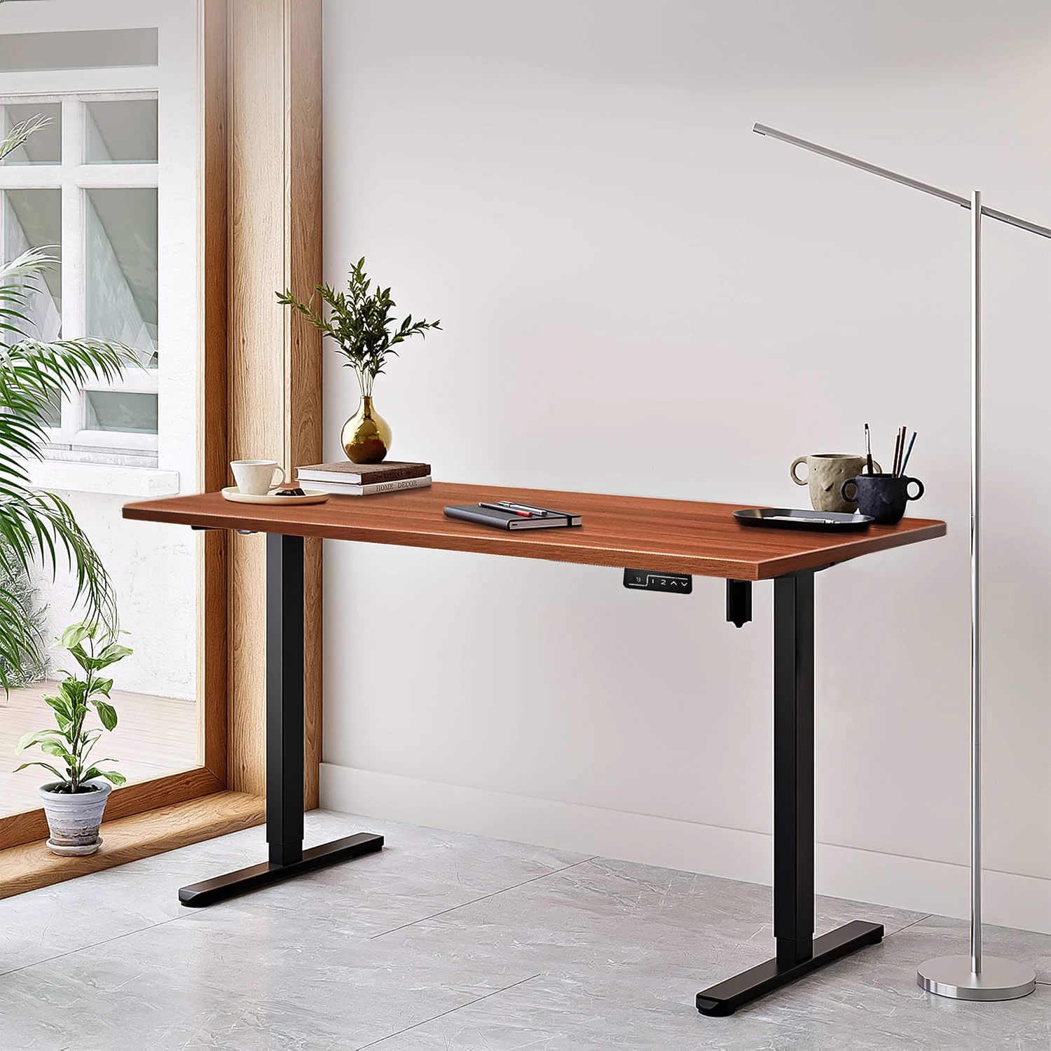 The walnut desk composed into a styled room scene with natural light